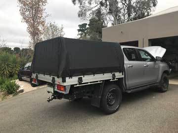 Dual Cab Hilux with Genuine Toyota Tray with rear ladder bar